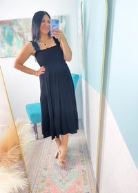 'Moonlight Shadow' Black Smocked Tiered Midi Dress-A classic black midi dress with a smocked top + ruffle straps. The lightweight fabric makes it perfect to throw on and go on hot Summer days but it can also be dressed up for semi casual events!-Cali Moon Boutique, Plainville Connecticut