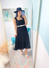 'Moonlight Shadow' Black Smocked Tiered Midi Dress-A classic black midi dress with a smocked top + ruffle straps. The lightweight fabric makes it perfect to throw on and go on hot Summer days but it can also be dressed up for semi casual events!-Cali Moon Boutique, Plainville Connecticut