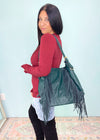 Peacock Green Distressed Faux Leather Fringe Detail Hobo Bag-This gorgeous peacock green slouchy hobo bag has a big city meets small town vibe! The luxurious soft faux leather has a vintage distressed feel and you will love every single detail on this including the braided strap and fringe details. An instant add to cart moment! -Cali Moon Boutique, Plainville Connecticut