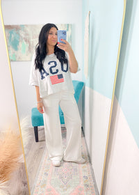'The Drift' White Wide Leg High Waist Stretch Pants-These white wide leg stretch pants are everyday chic. The super flattering wide waistband is ultra comfortable and non restricting paired with a smooth and soft nylon fabric.-Cali Moon Boutique, Plainville Connecticut