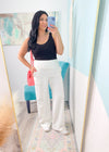 'The Drift' White Wide Leg High Waist Stretch Pants-These white wide leg stretch pants are everyday chic. The super flattering wide waistband is ultra comfortable and non restricting paired with a smooth and soft nylon fabric.-Cali Moon Boutique, Plainville Connecticut